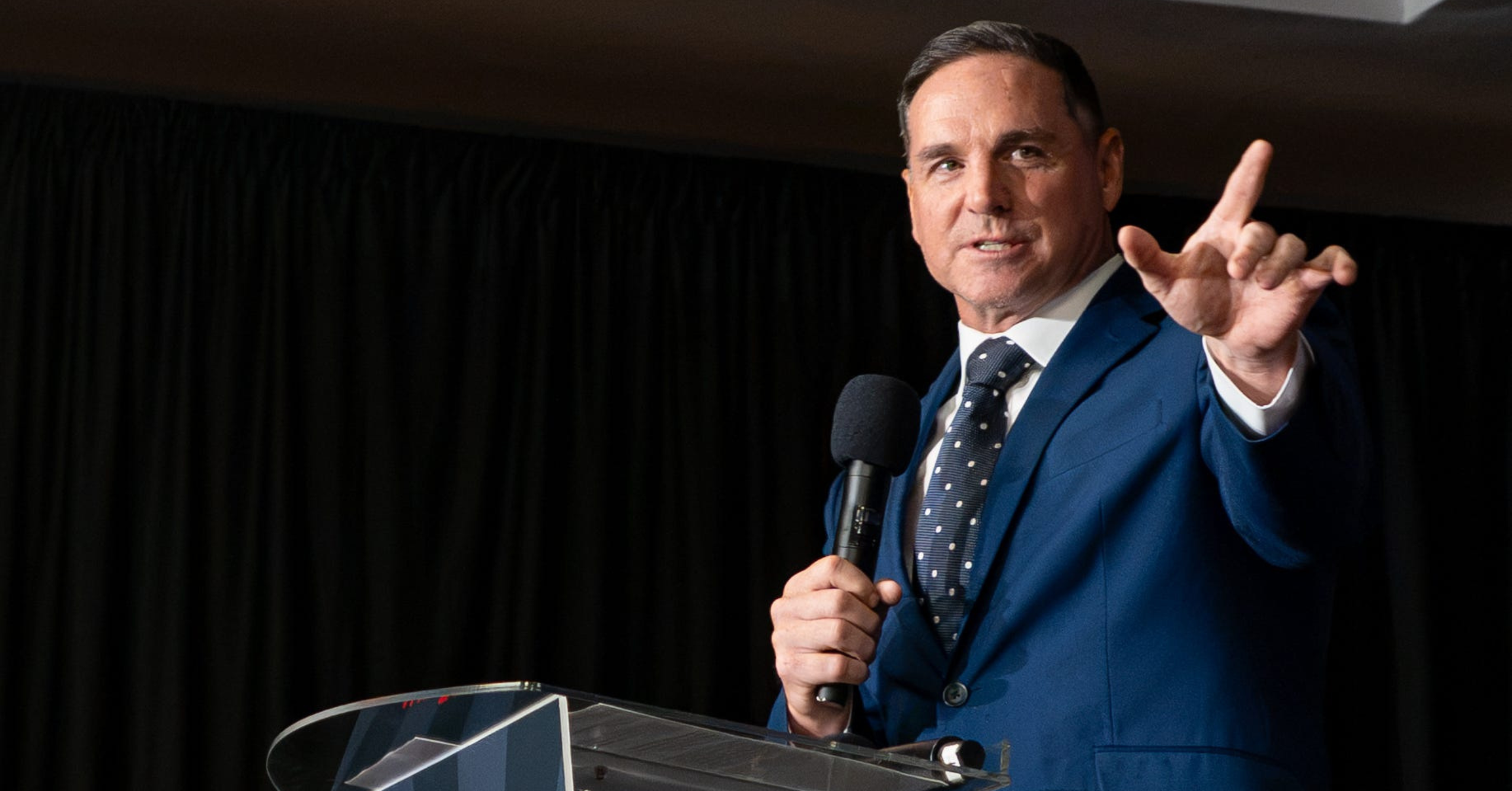 Jay Feely celebrates his victory in the 1st Congressional District GOP primary during a party at Hilton Garden Inn in Scottsdale on July 21, 2026.