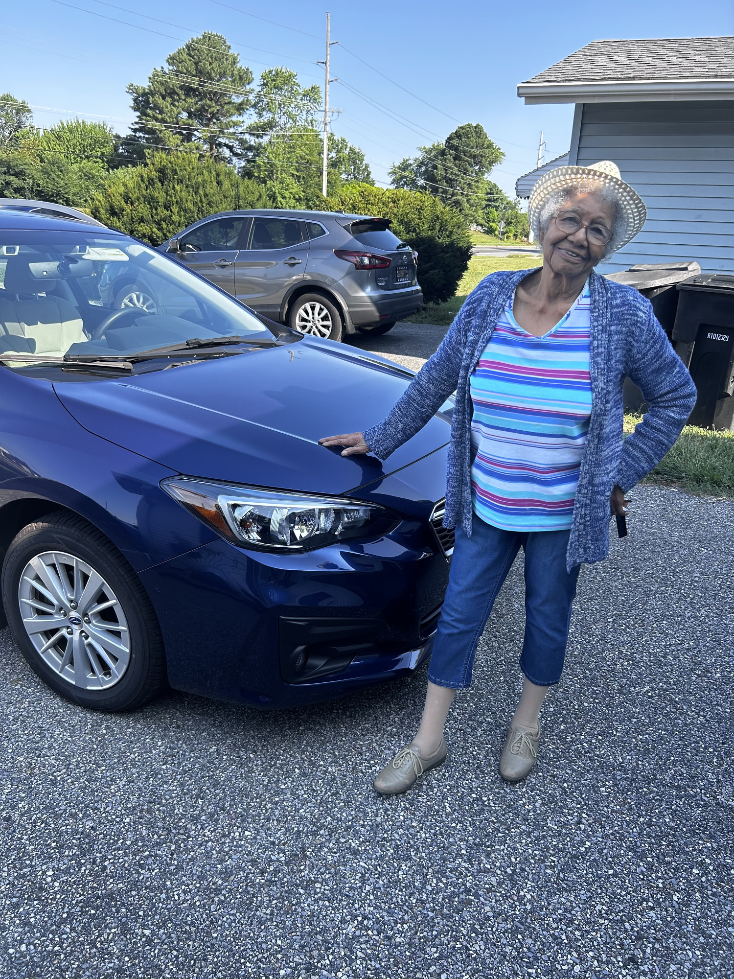 Susan Young Browne with her trusty blue Subaru. (Courtesy Lynnette Overby)