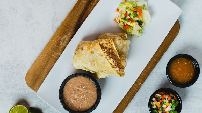 How To Make Taco Bell-Inspired Refried Beans Right At Home