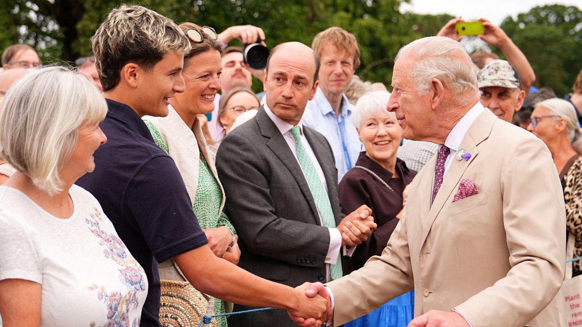 Crowds lined up to shake the King's hand during the opening day of the show