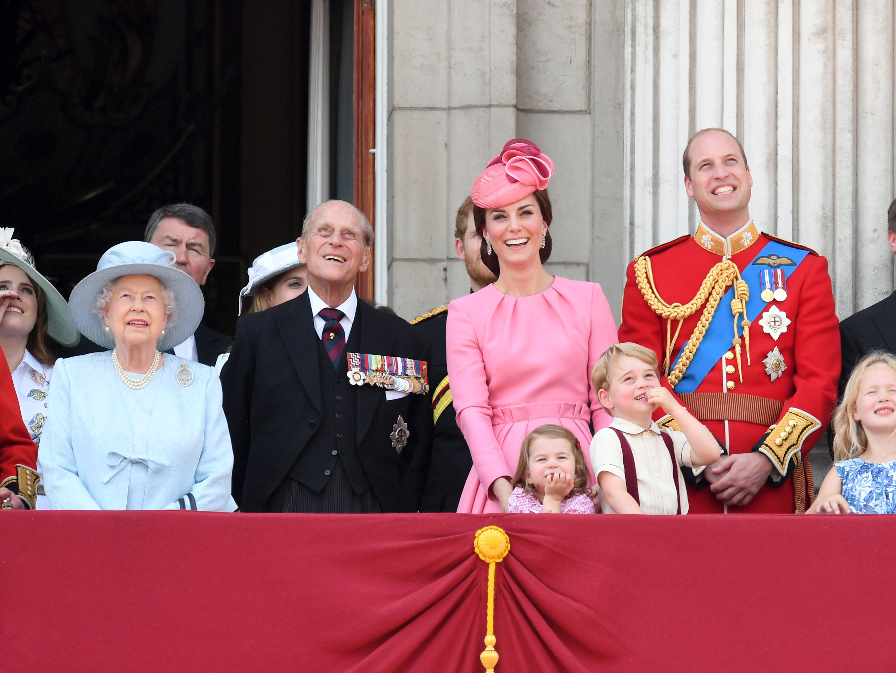 2017: Queen Elizabeth II, Prince Philip, Duke of Edinburgh, Catherine, Duchess of Cambridge, Princess Charlotte of Cambridge, Prince George of Cambridge and Prince William, Duke of Cambridge look on from the balcony during the annual Trooping The Colour parade at the Mall on June 17, 2017, in London, England.