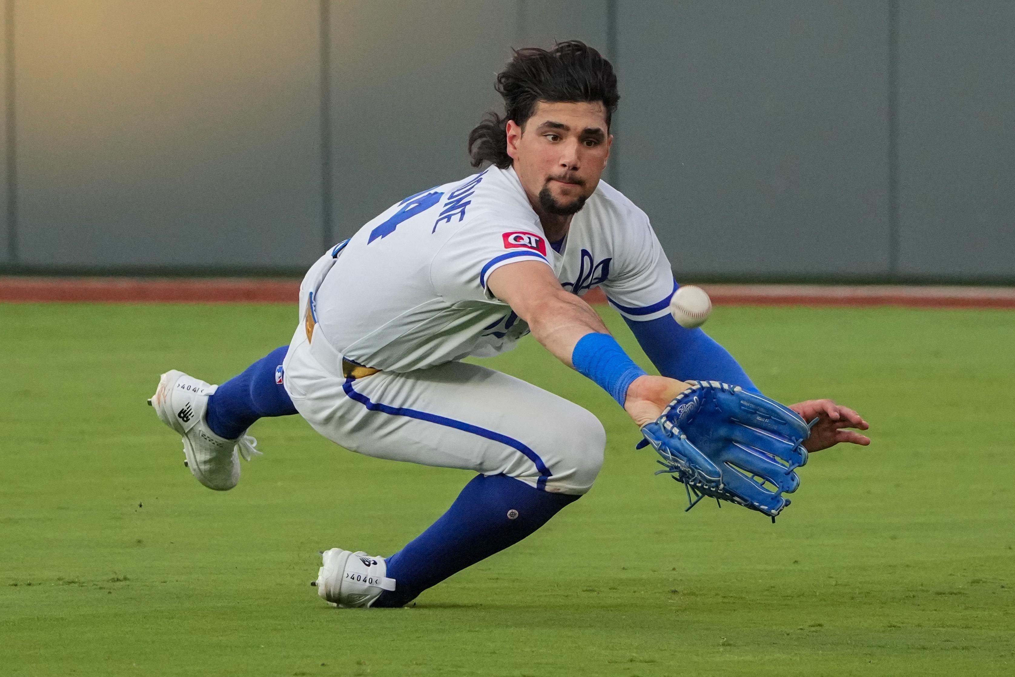 Jul 21, 2026; Kansas City, Missouri, USA; Kansas City Royals right fielder Jac Caglianone (14) dives for but misses a fly ball in right field against the San Francisco Giants during the fifth inning at Kauffman Stadium. Mandatory Credit: Denny Medley-Imagn Images