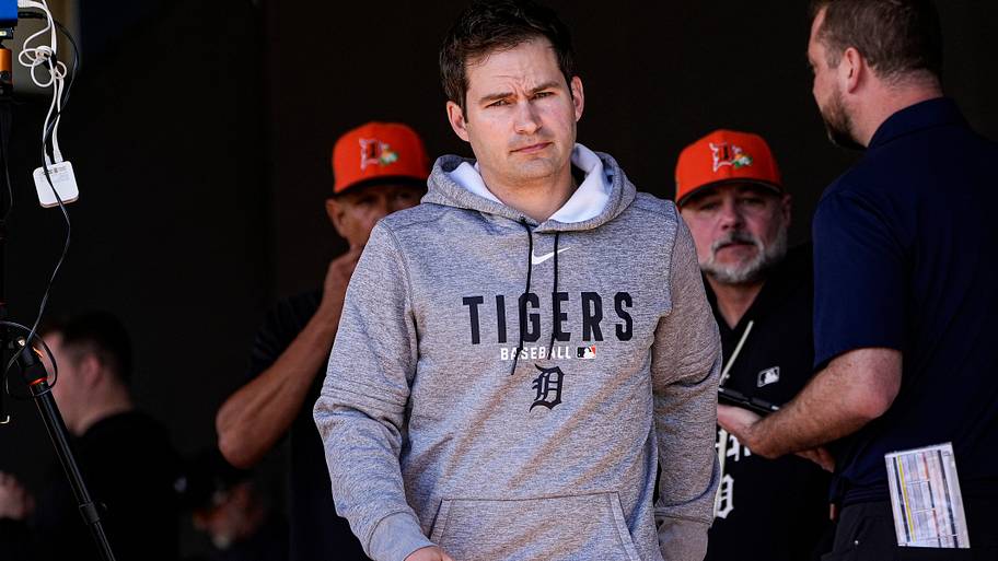 Detroit Tigers president of baseball operations Scott Harris walks while wearing a hoodie with Tigers on the front