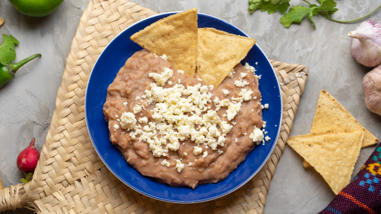 How To Make Taco Bell-Inspired Refried Beans Right At Home