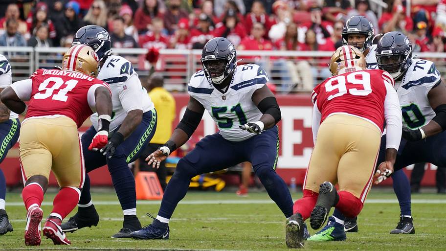 Seattle Seahawks center Olu Oluwatimi (51) blocks San Francisco 49ers defensive tackle Sam Okuayinonu (91)