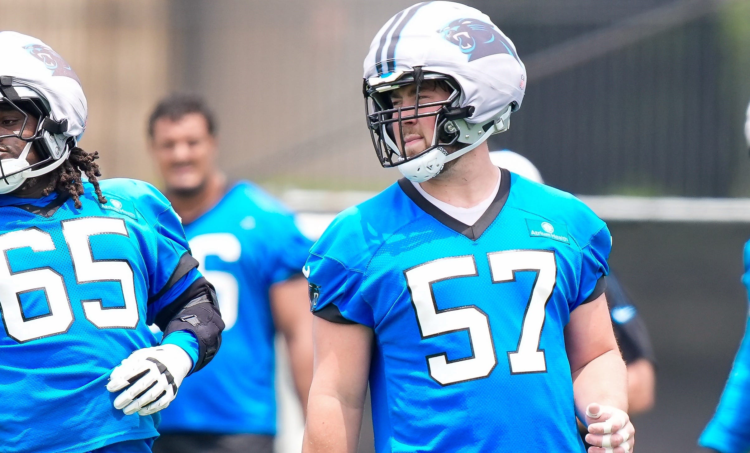 Jun 9, 2026; Charlotte, NC, USA; Carolina Panthers tackle Monroe Freeling (57) and guard Ja’Tyre Carter (65) during the first day of mini camp at Bank of America Stadium practice facility. Mandatory Credit: Jim Dedmon-Imagn Images