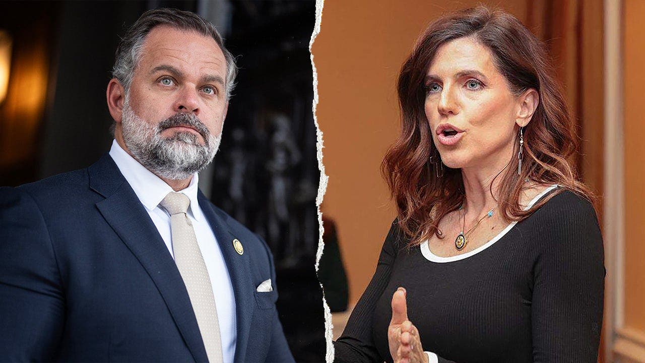 Cory Mills, left, pictured alongside Nancy Mace, right