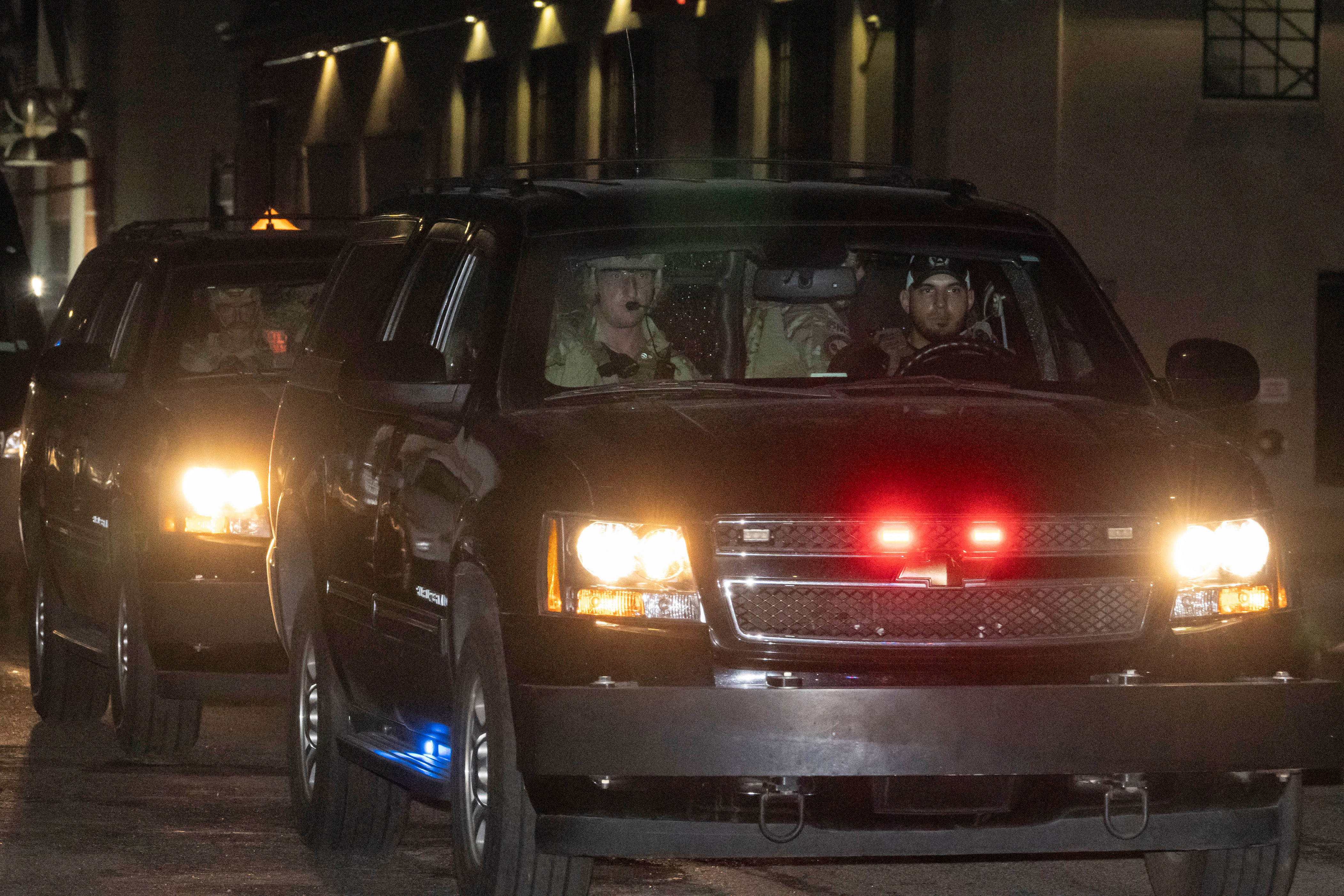 A motorcade of cars.