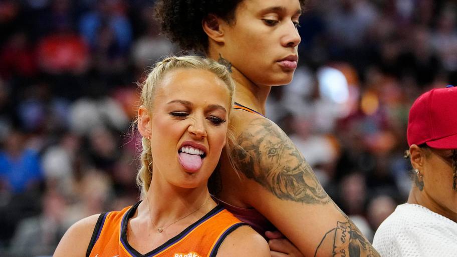 Mercury guard Sophie Cunningham and center Brittney Griner pose for a photo together.