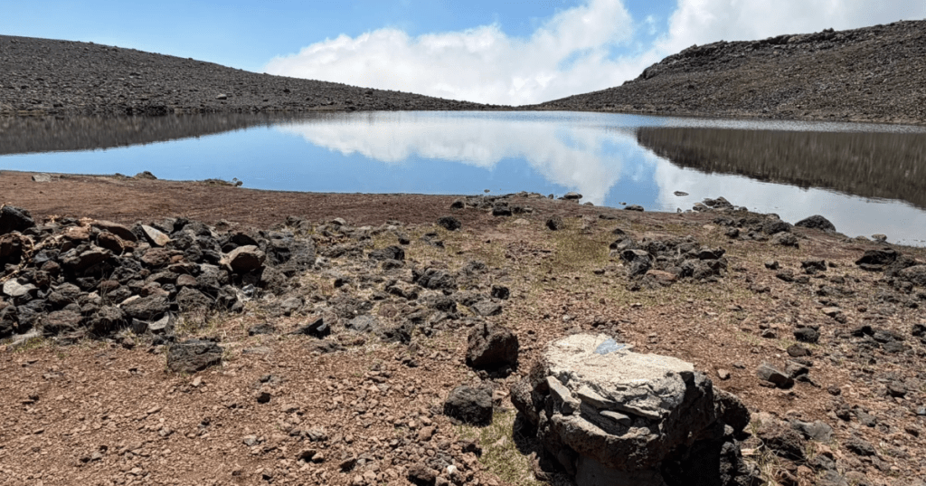 Lake Waiau from Mauna Kea Access Road on a sunny day.