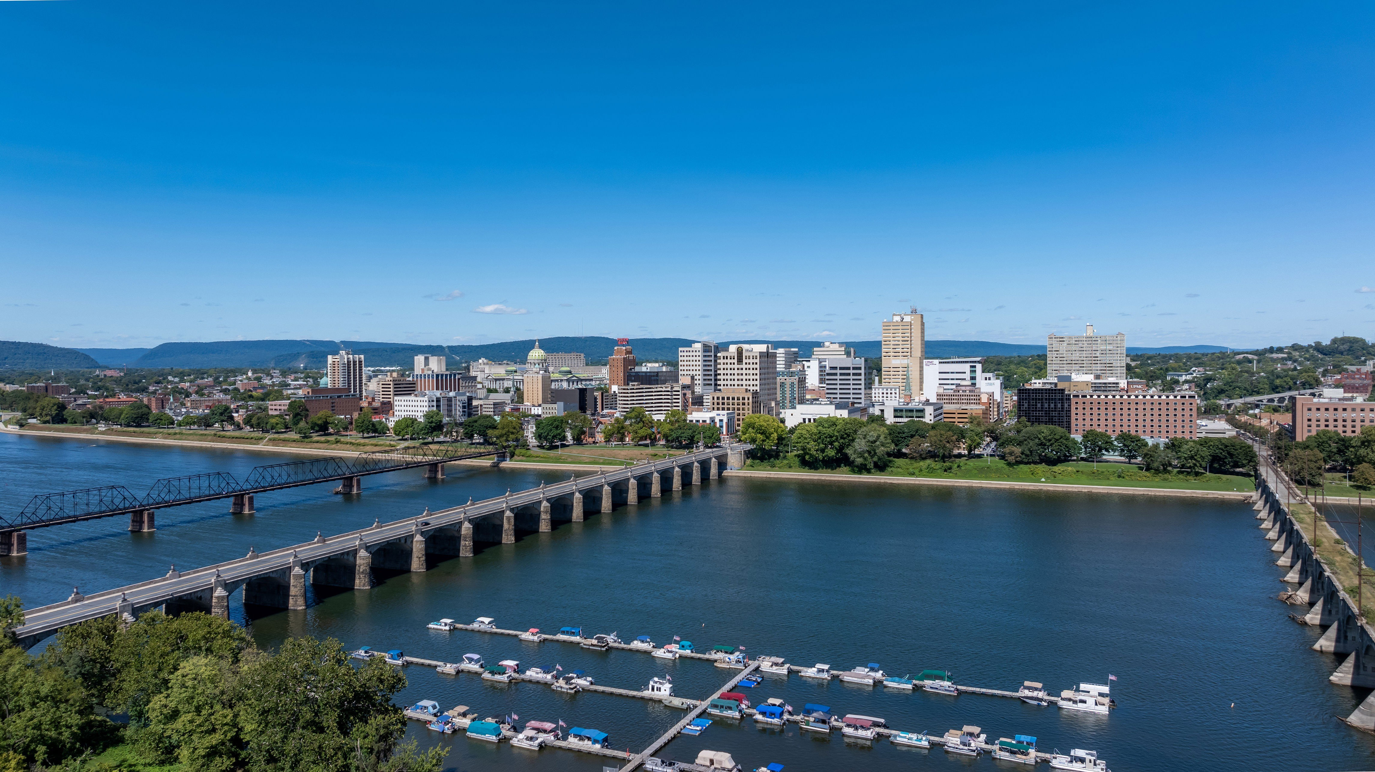Harrisburg, Pennsylvania. Late summer, early fall aerial, drone, photo of the Harrisburg Pennsylvania skyline and the Susquehanna River. September 2024.