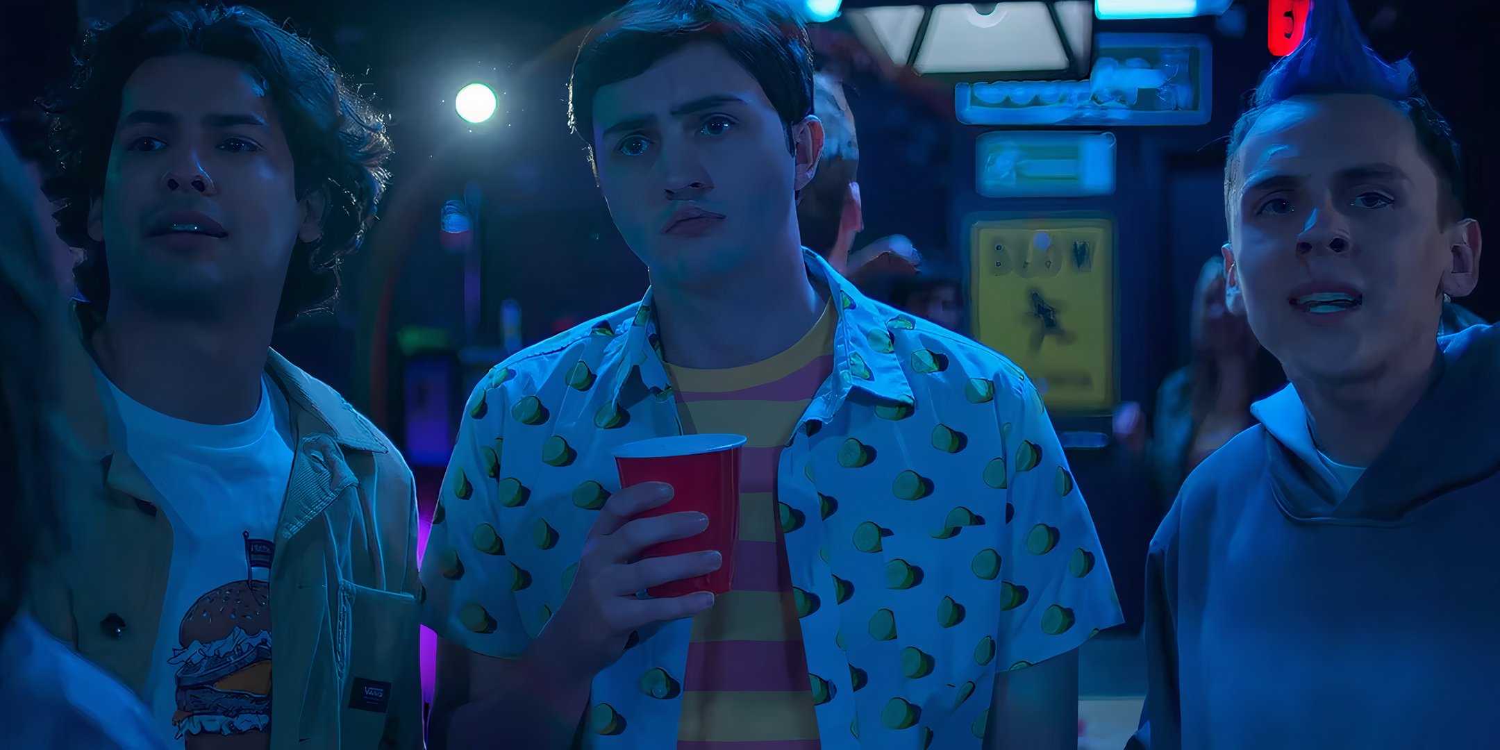 Miguel, Demetri and Hawk looking worried at a frat party in Cobra Kai season 6 part 1