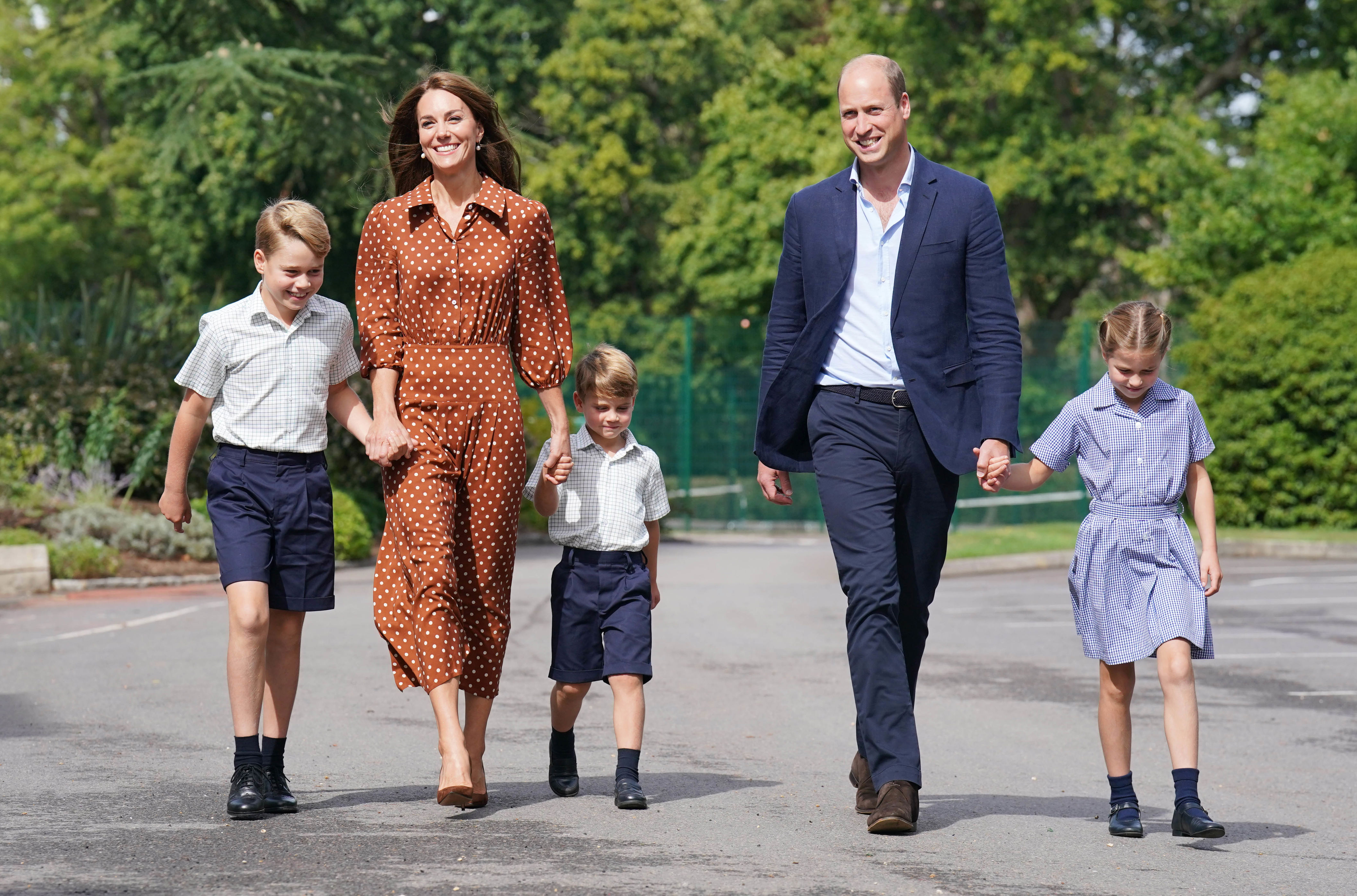 Prince George, Princess Charlotte and Prince Louis (C), accompanied by their parents the Prince William, Duke of Cambridge and Catherine, Duchess of Cambridge, arrive for a settling in afternoon at Lambrook School, near Ascot on September 7, 2022 in Bracknell, England. The family have set up home in Adelaide Cottage in Windsor's Home Park as their base after the Queen gave them permission to lease the four-bedroom Grade II listed home.