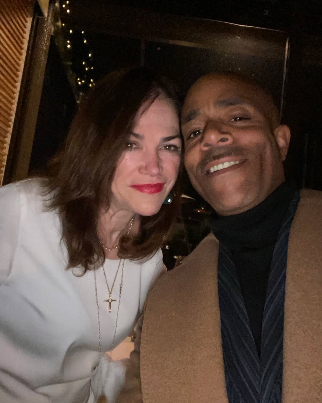 Kim Delaney and James Morgan posing for a photo.