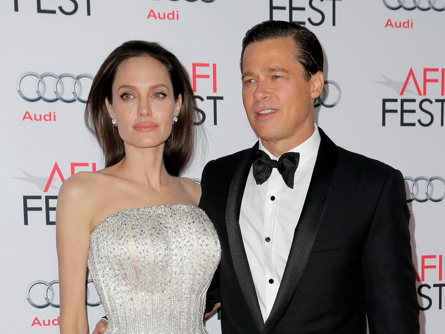 Which of Brad Pitt & Angelina Jolie's kids are still using their dad's last name?