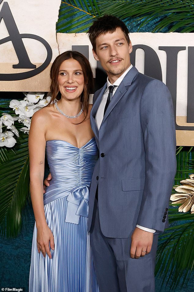 While chatting with Cooper, Brown revealed she peed in a cup on the side of the highway during a road trip with her husband, Jake Bongiovi (seen in June)
