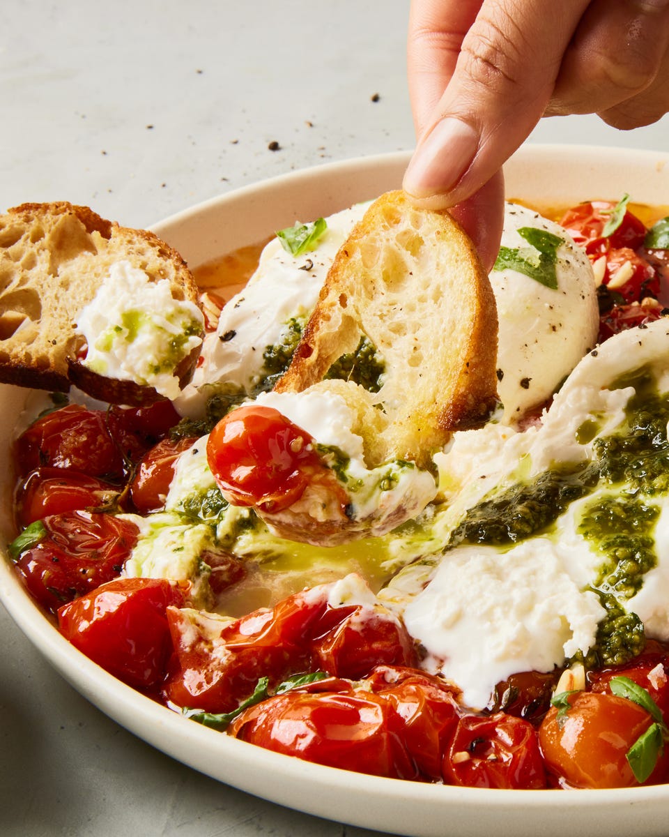 delish120723_pesto-stuffed-burrata-bombs_100_rl_hi-res_vertical.jpg