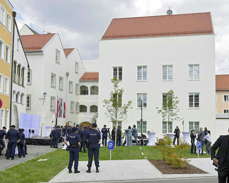 Police officers, journalists and guests attend an inauguration ceremony for a new police unit at the birthplace of Adolf Hitler. Photograph: Manfred Fesl/APA/AFP/Getty Images