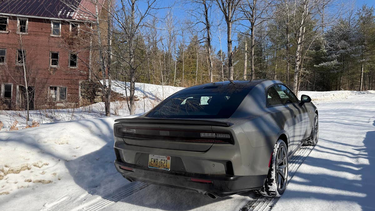 2026-dodge-charger-rt-2-door-in-gray-rear-angled-view-on-snow