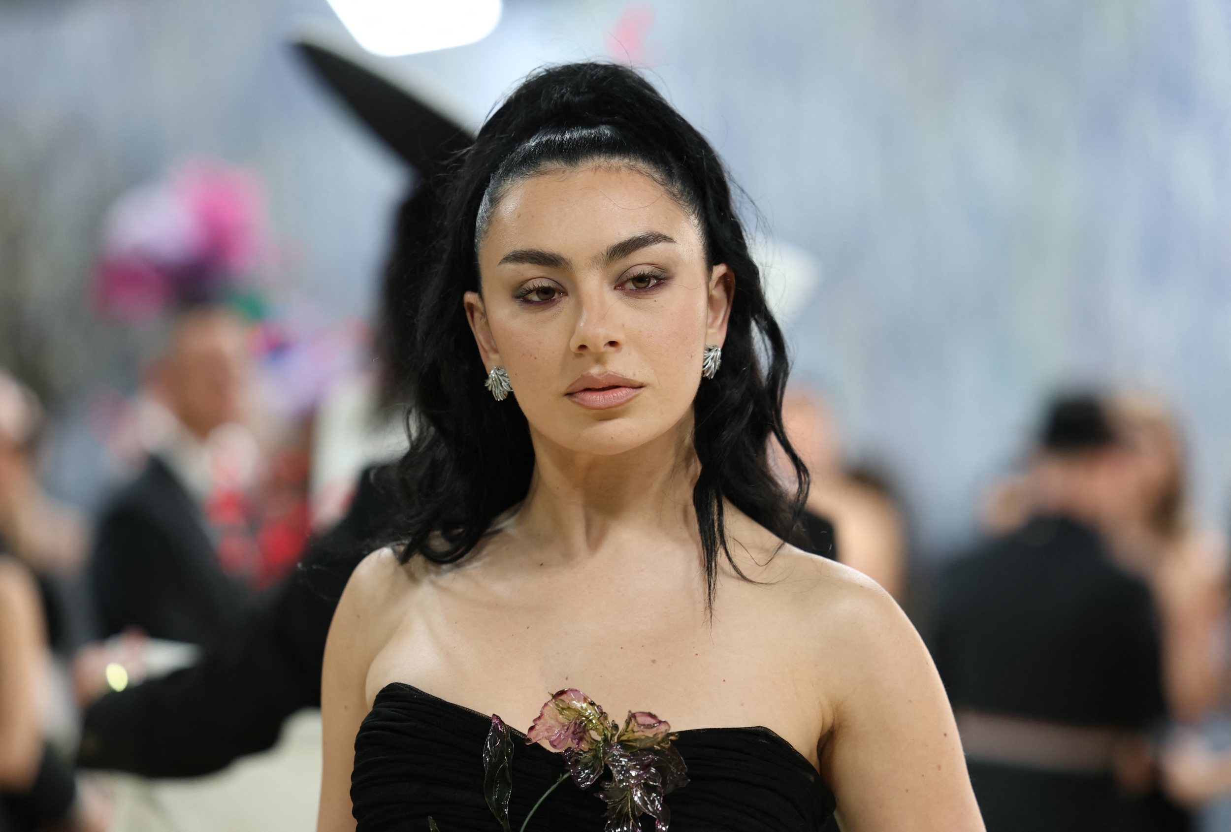 Steal Charli XCX's Celebrity Style With These Elegant Little Black Wedding Guest Outfit Ideas