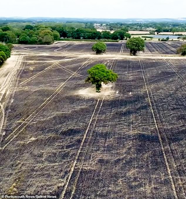 Stunning images show two–thirds of one field blackened – while half of an adjacent field has also been damaged