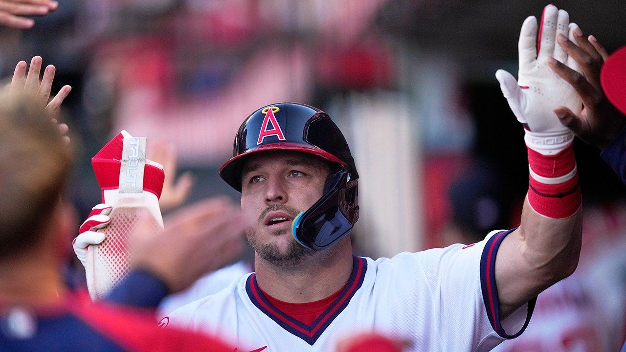 Angels third baseman brings basketball onto the diamond, turns slick double play with unconventional move
