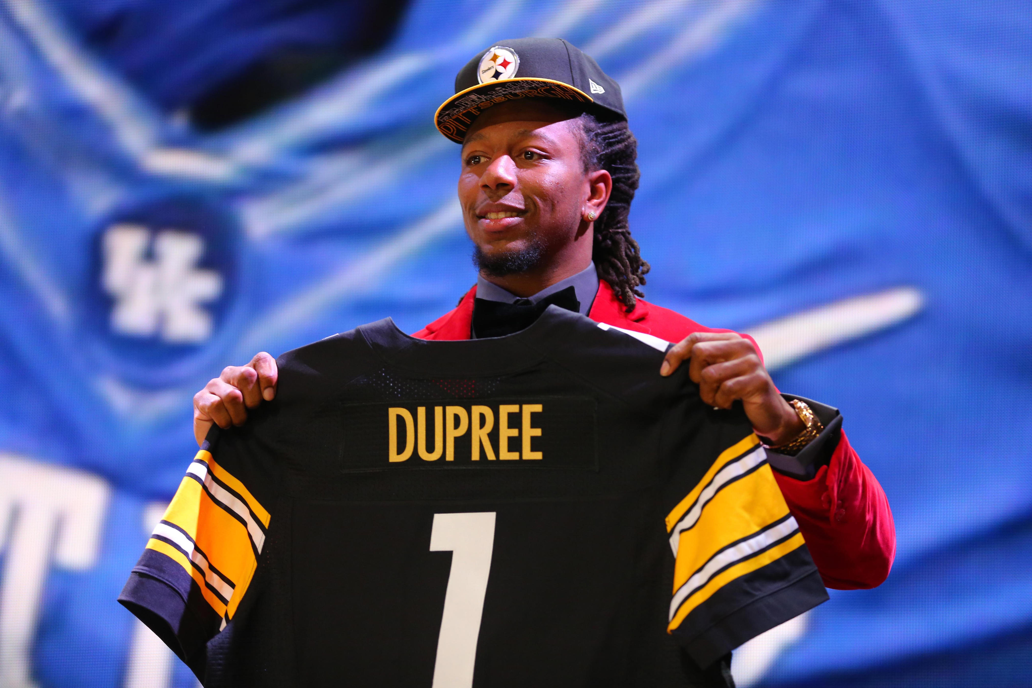 Apr 30, 2015; Chicago, IL, USA; Bud Dupree (Kentucky) poses for a photo after being selected as the number 22nd overall pick to the Pittsburgh Steelers in the first round of the 2015 NFL Draft at the Auditorium Theatre of Roosevelt University. Mandatory Credit: Dennis Wierzbicki-USA TODAY Sports