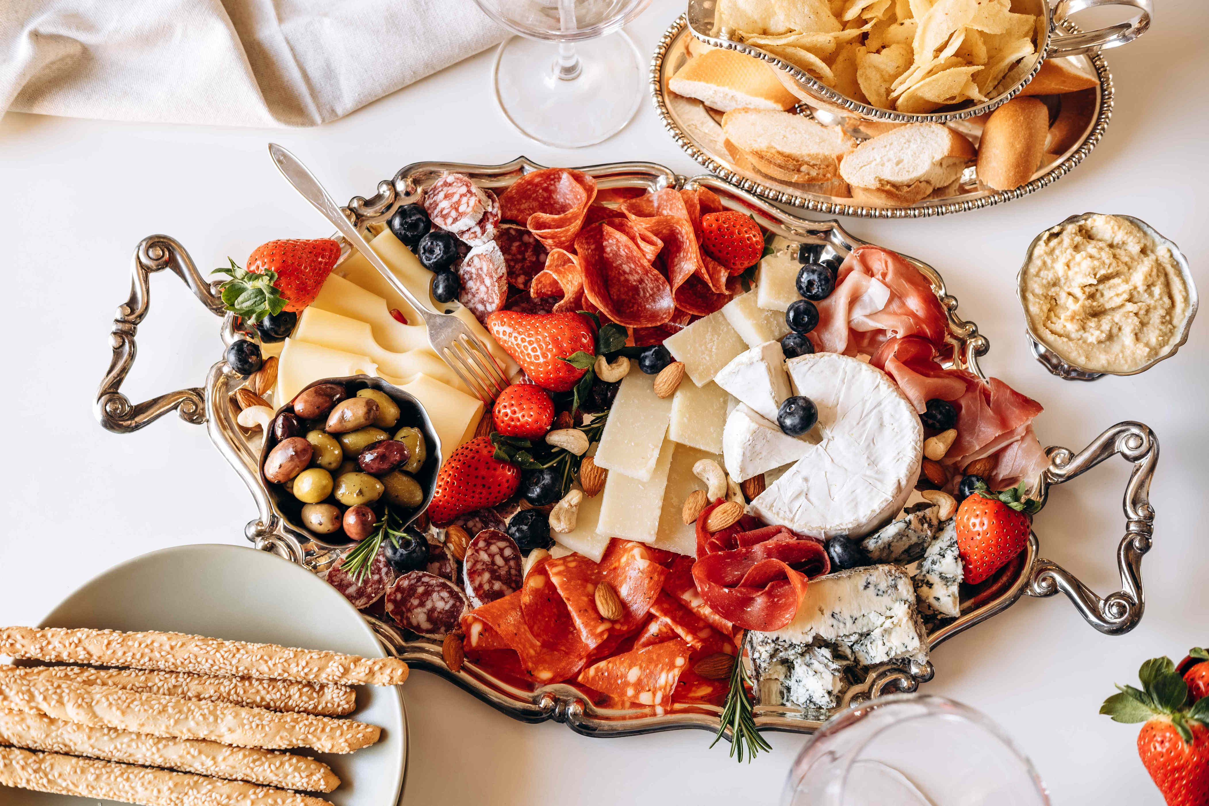 This whimsical cheese-village grazing board looks straight out of a fairytale