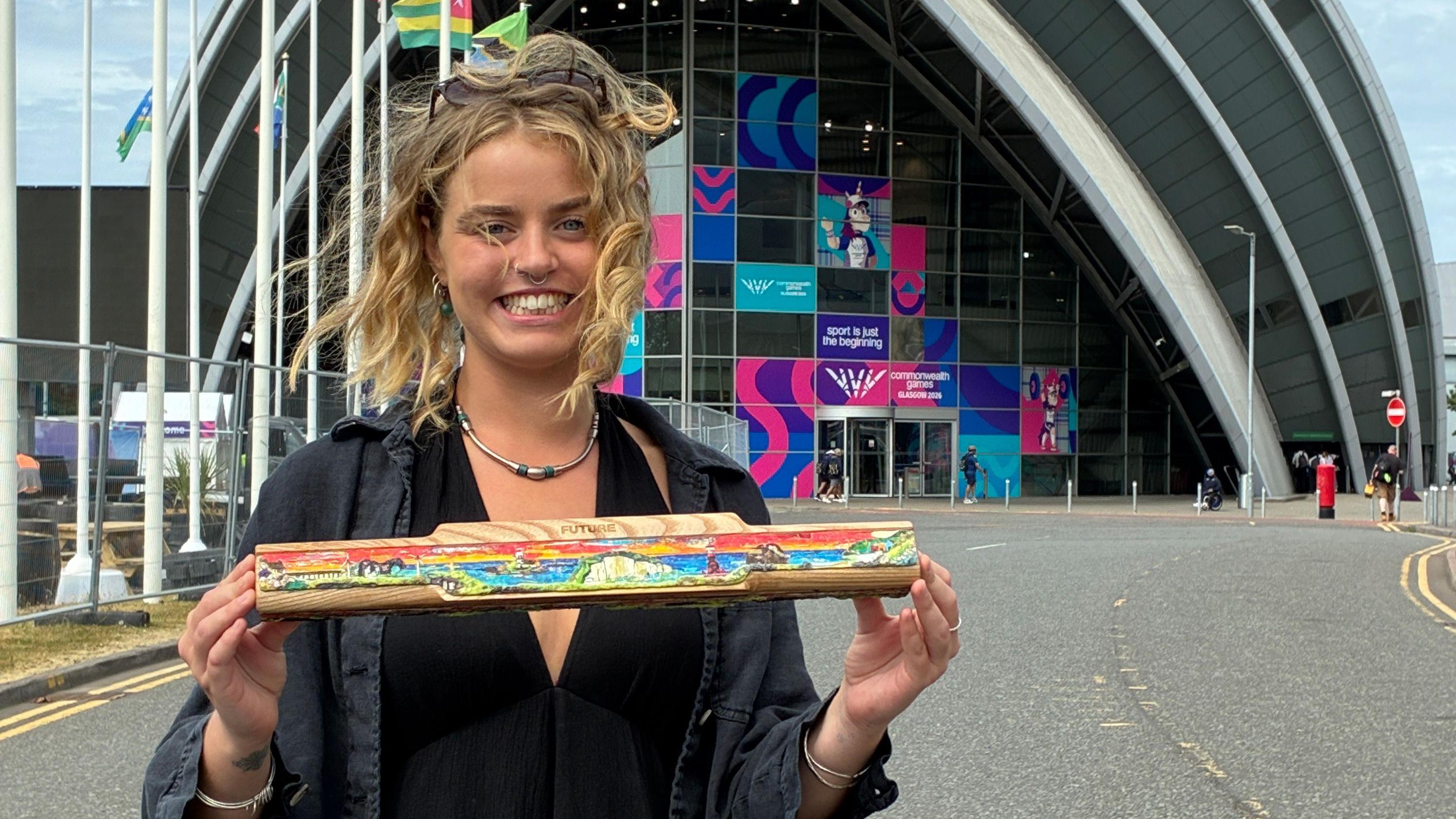 England's baton includes a replica of the Ribblehead viaduct made from a hair comb