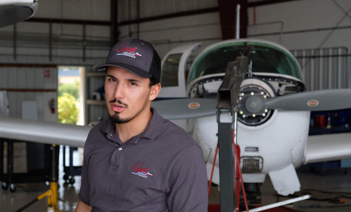 Aircraft mechanic Cristian Plasencia walks through the Loyd’s Aviation maintenance shop and explains the types of aircraft at the Paso Robles Airport on July 13, 2026. Plasencia graduated from the aircraft maintenance program at Cuesta College.