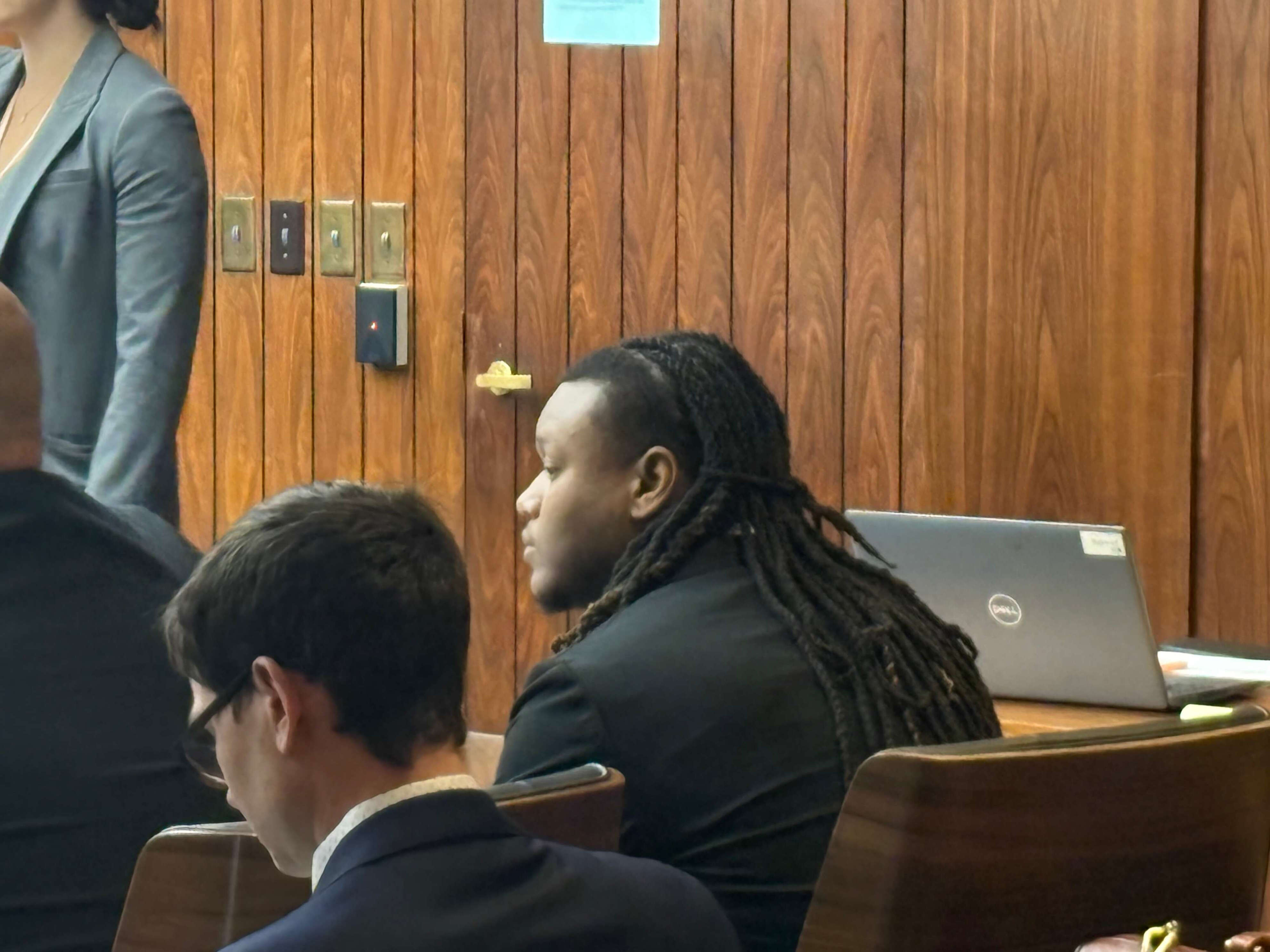 Shavar S. Craft Jr. sits at the defense table during his trial on murder, assault with intent to murder, and firearms charges in Saginaw County Circuit Court on July 22, 2026. Craft is accused of shooting 25-year-old Da'Quan L. Mims 11 times, killing him, outside West Side Party Store on June 16, 2024.