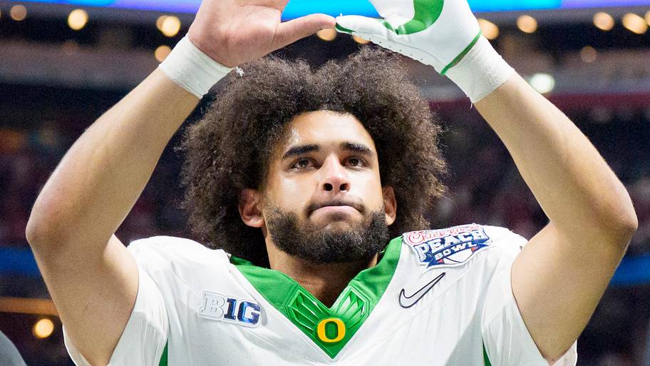 oregon ducks dante moore quarterback rankings heisman trophy dan lanning nfl draft decision college football playoff \