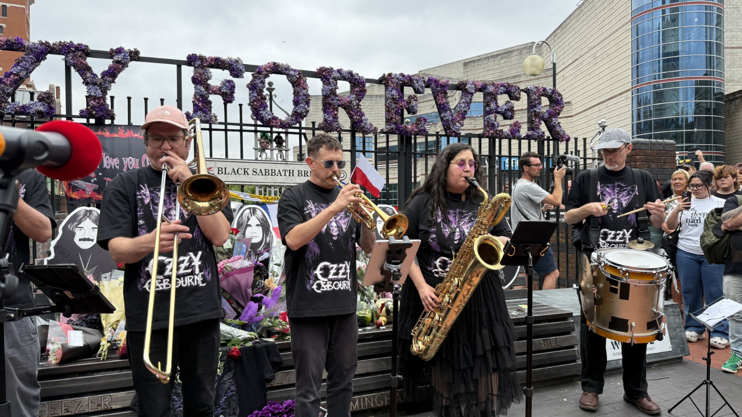 Bostin Brass performing for the crowds at the Black Sabbath bench