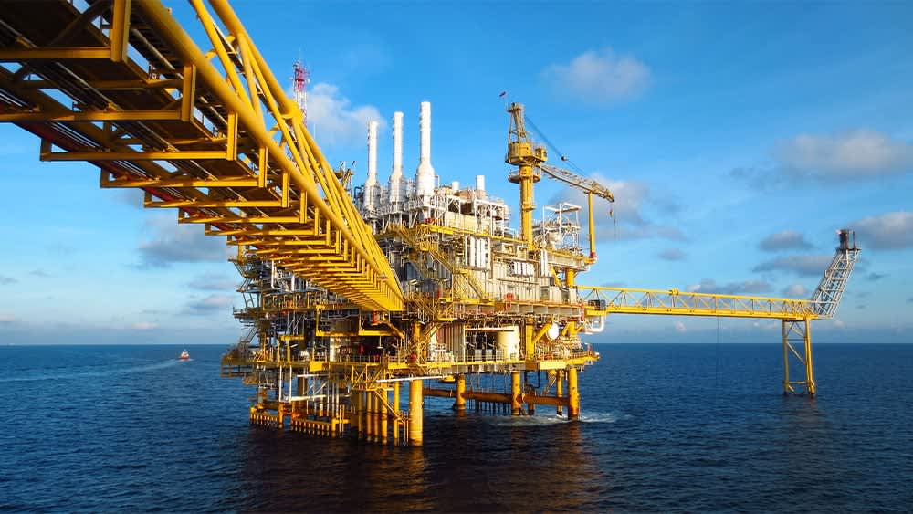 Oil shocks spur energy name to highs; stock nears pivot with earnings ahead