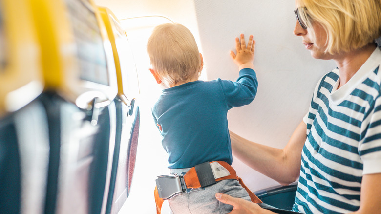 Which Class Should You Book When You're Flying With Kids?