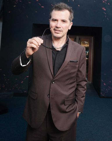 John Leguizamo attends Universal Pictures