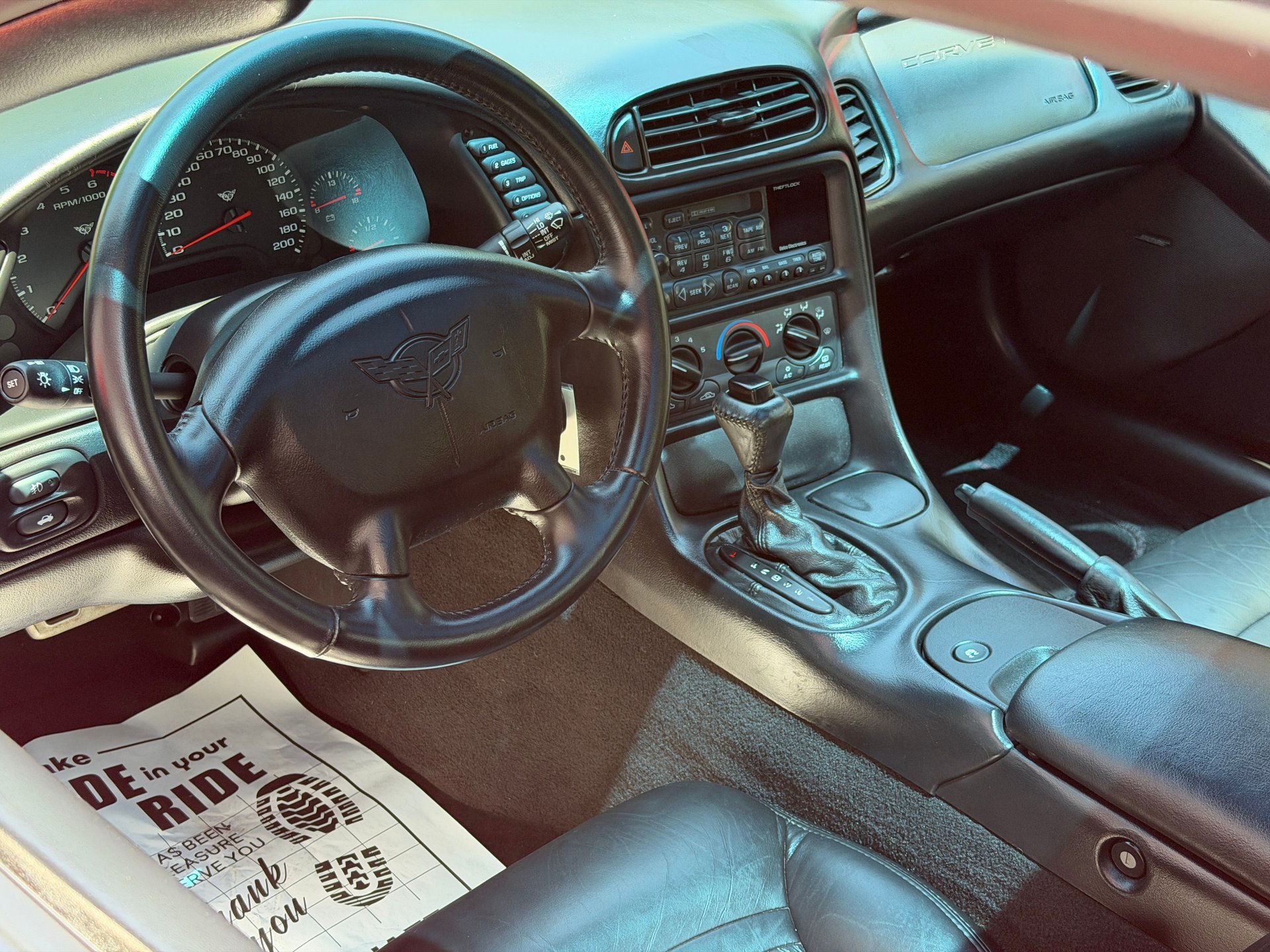 1997 Chevrolet Corvette Coupe rear three-quarter view with removable roof panel