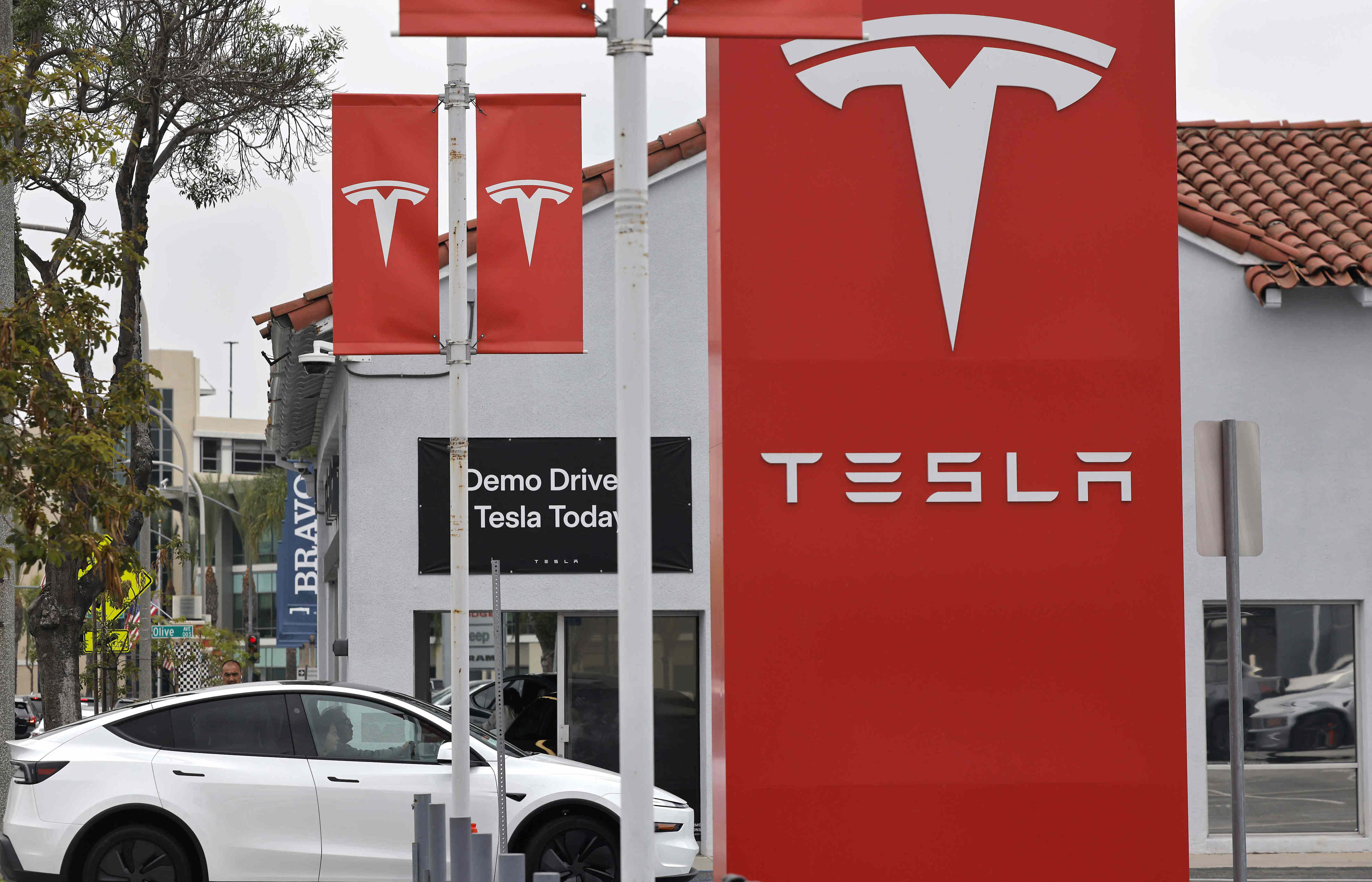 Big tech earnings live: Tesla and Google parent Alphabet will be the first Magnificent 7 companies to release results