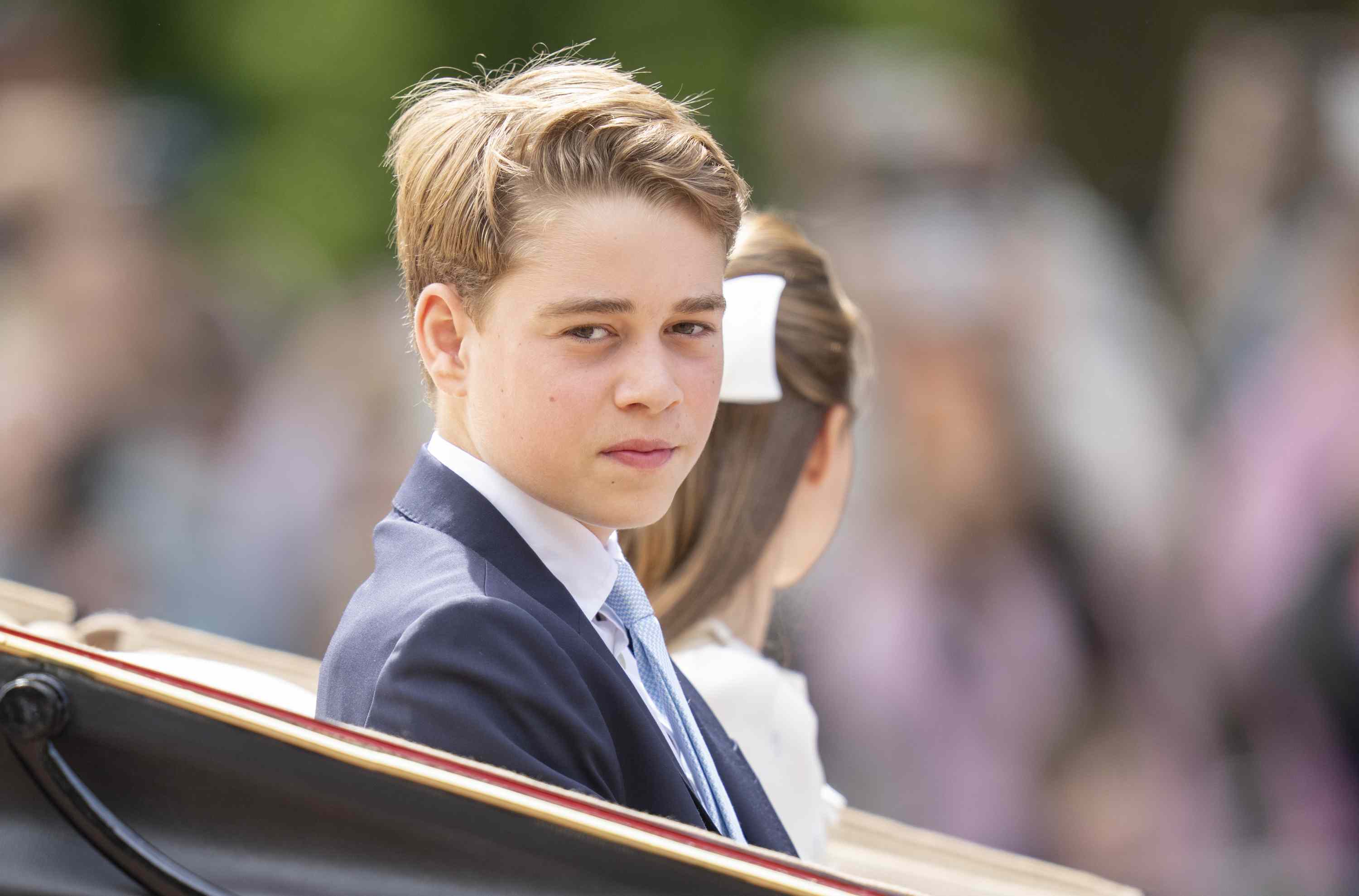 Prince George looks like a young Prince William while playing with his newest family member in rare 13th birthday video