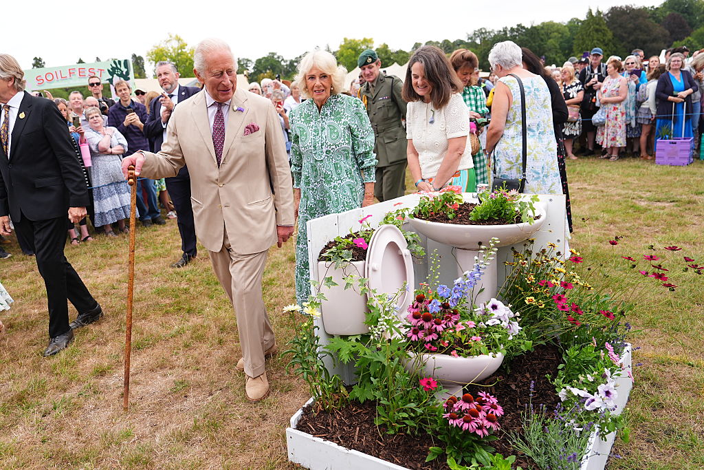 SANDRINGHAM, NORFOLK - JULY 22: King Charles III, Patron of the Royal Horticultural Society (RHS) and Queen Camilla during a visit to the RHS Sandringham Flower Show, which is being held for the first time this year on the Sandringham Estate on July 22, 2026 in Sandringham, Norfolk. The event was the first Royal Horticultural Society (RHS) show to be held at Sandringham Estate. (Photo by Aaron Chown - WPA Pool/Getty Images)