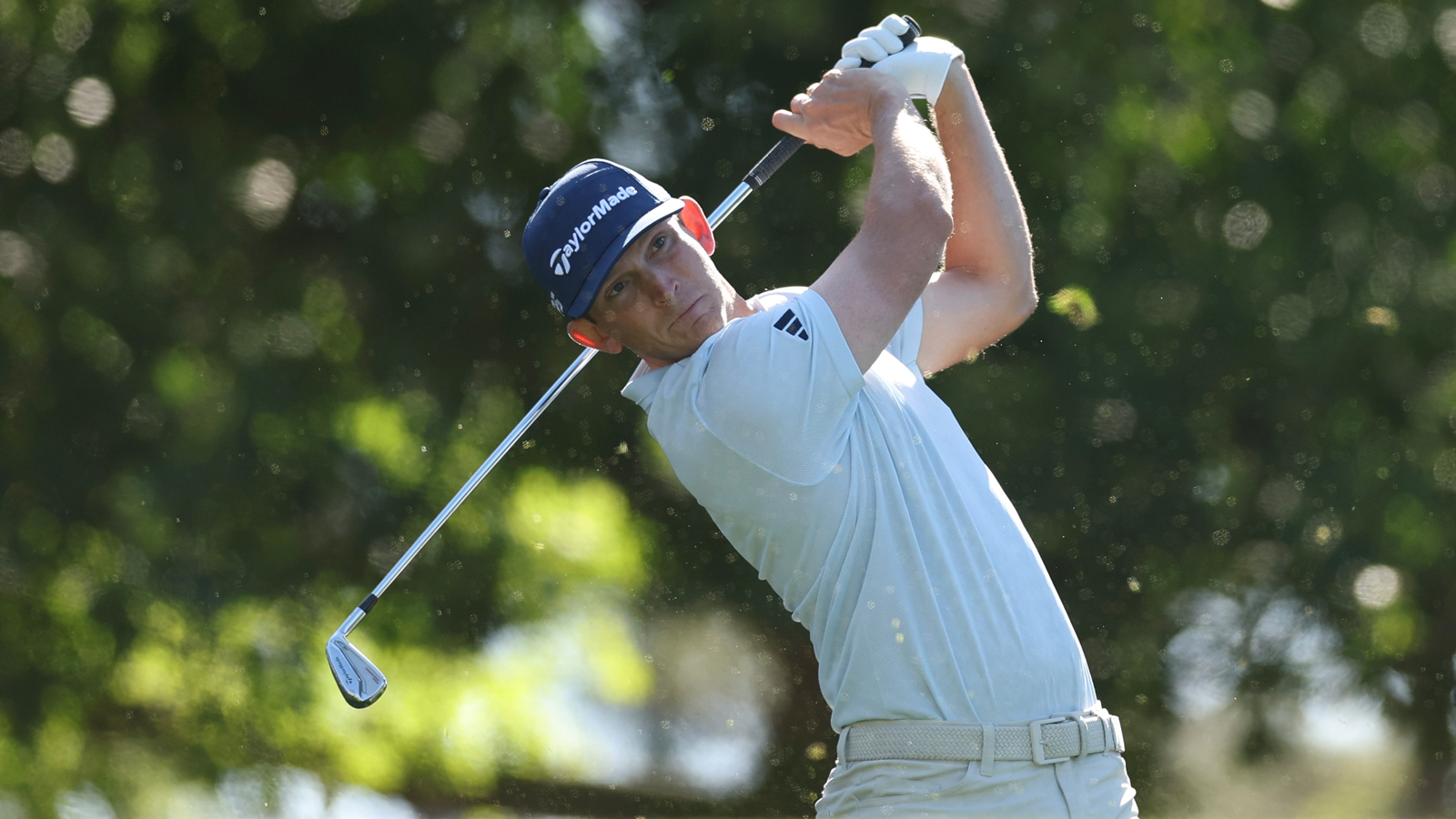 Jacob Bridgeman hits a utility iron
