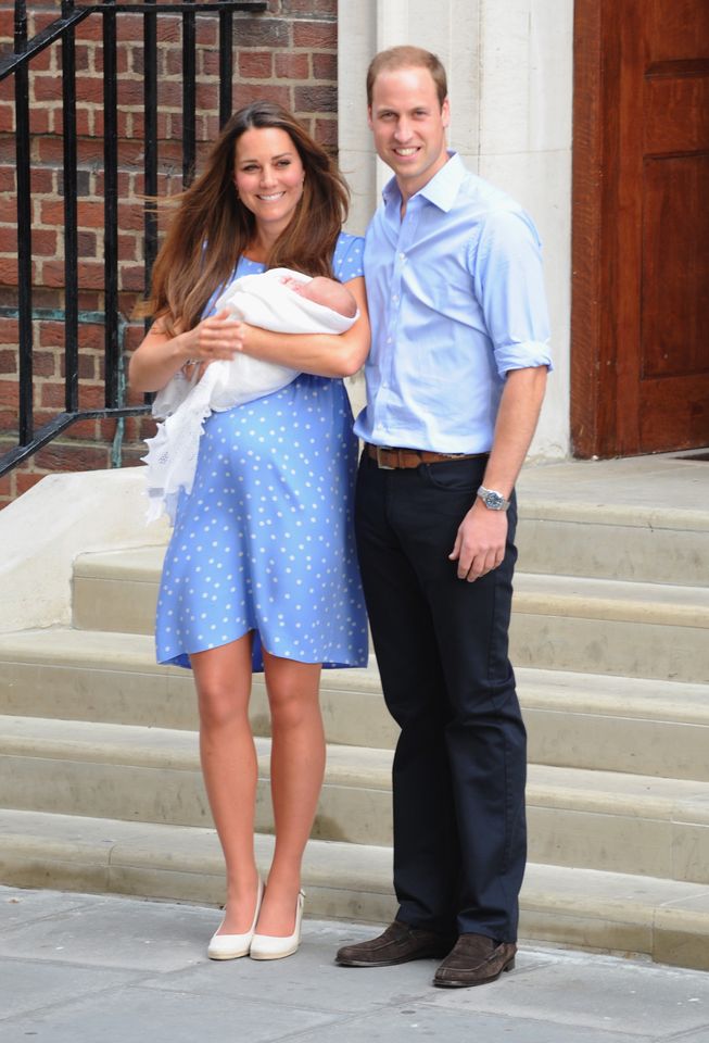 Kate Middleton and Prince William introducing Prince George to the world.