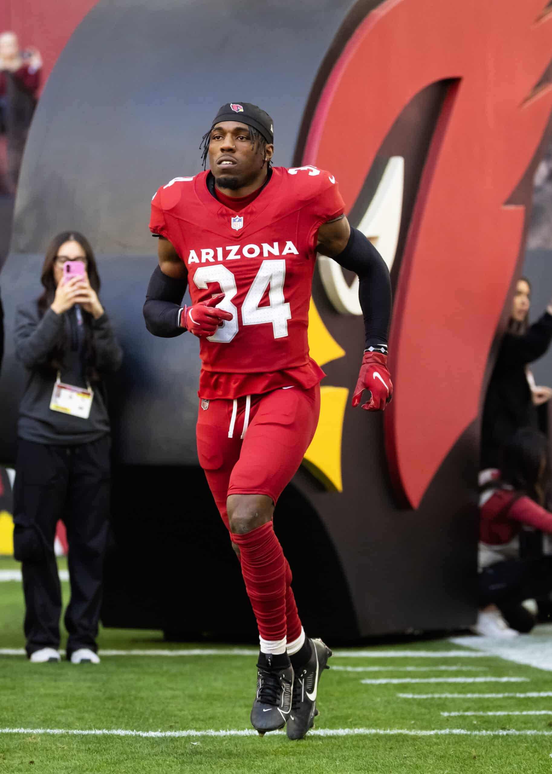 Dec 7, 2025; Glendale, Arizona, USA; Arizona Cardinals safety Jalen Thompson (34) against the Los Angeles Rams at State Farm Stadium. Mandatory Credit: Mark J. Rebilas-Imagn Images