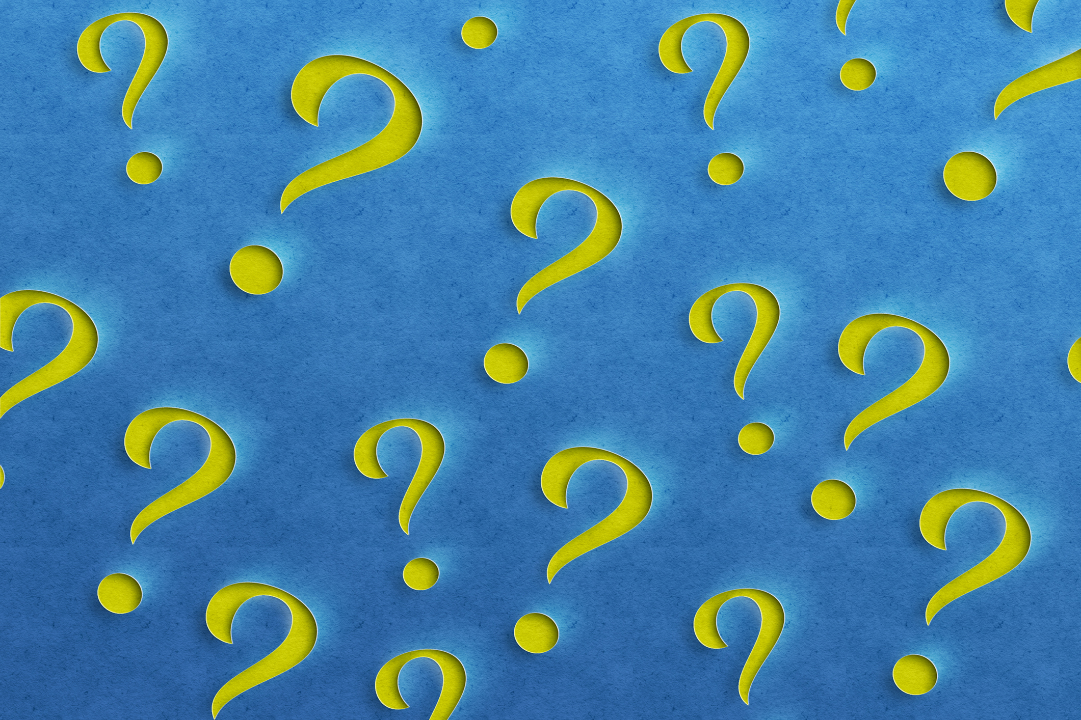 a bunch of yellow question marks on a blue background