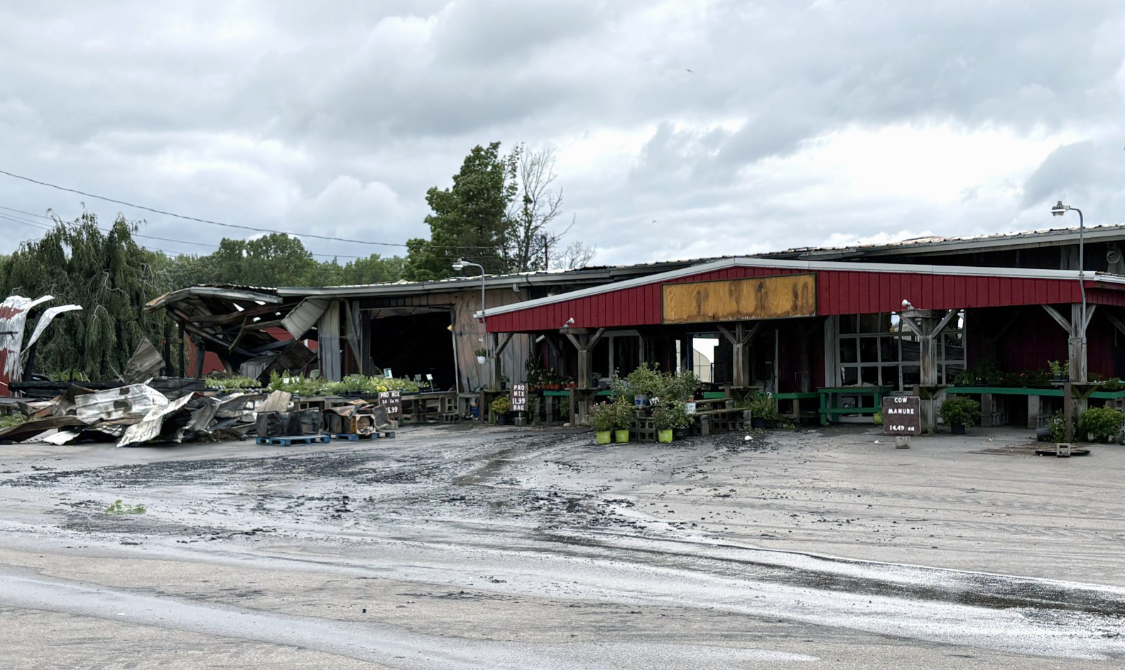 A large fire destroyed the market building at Bauman's Farm on Five Mile Line Road in Webster early Wednesday morning.