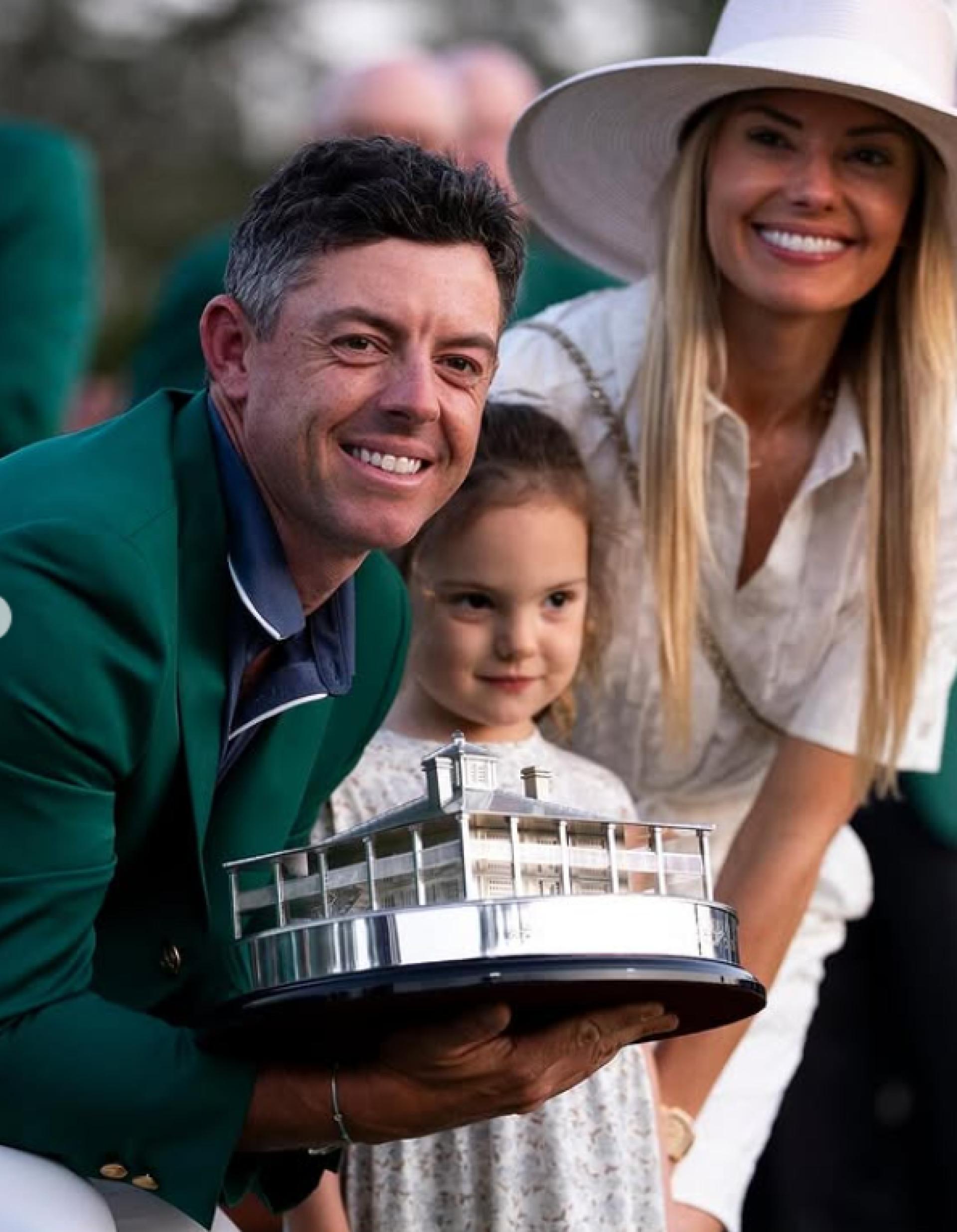 Rory McIlroy, daughter Poppy and wife, Erica Stoll after his Masters victory (2025)