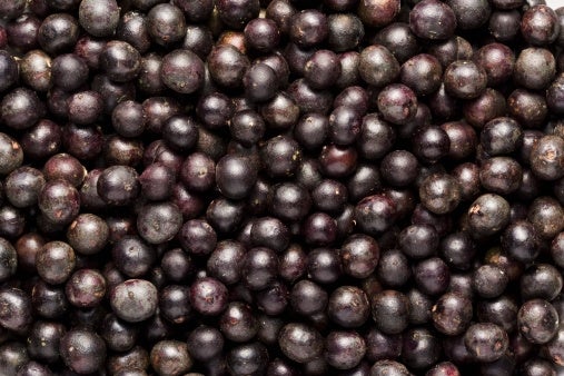 A close-up of a large pile of acai berries