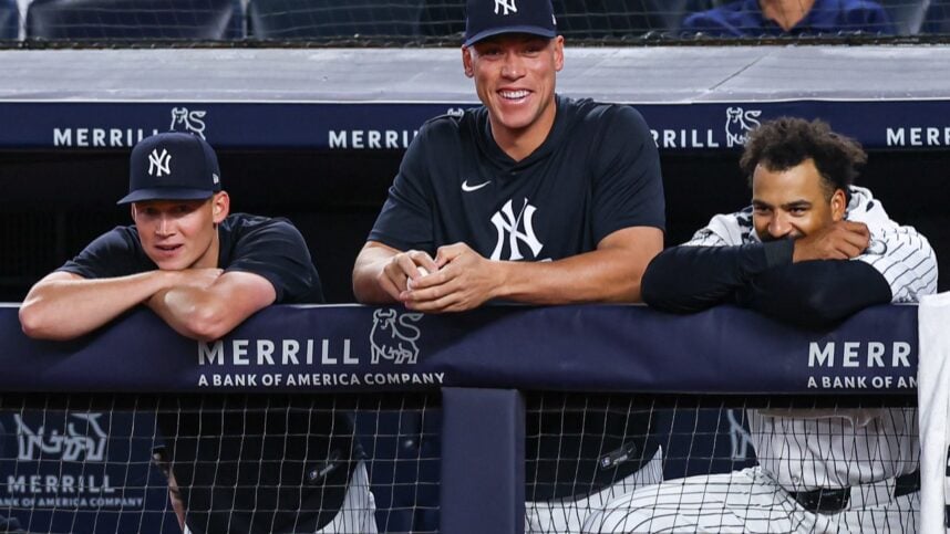 Aaron Judge watching a Yankees game from the dugout