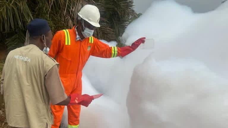 Mysterious white foam draws crowds on Nigerian highway