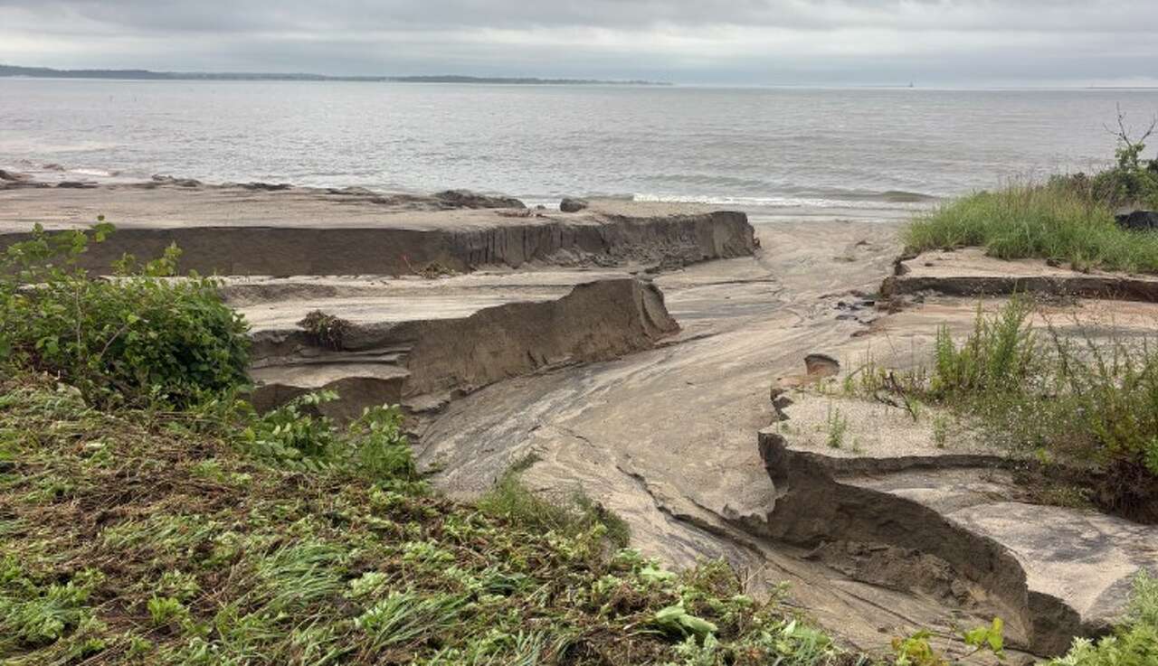 Floodwaters carved 5-foot canyons through West Haven beaches, official says